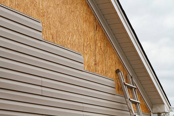 Professional Siding Replacement technician working in Germantown, IL